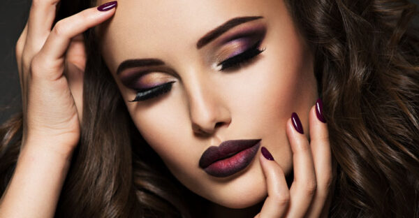 beautiful woman portrait with makeup face. nail, lips and hair