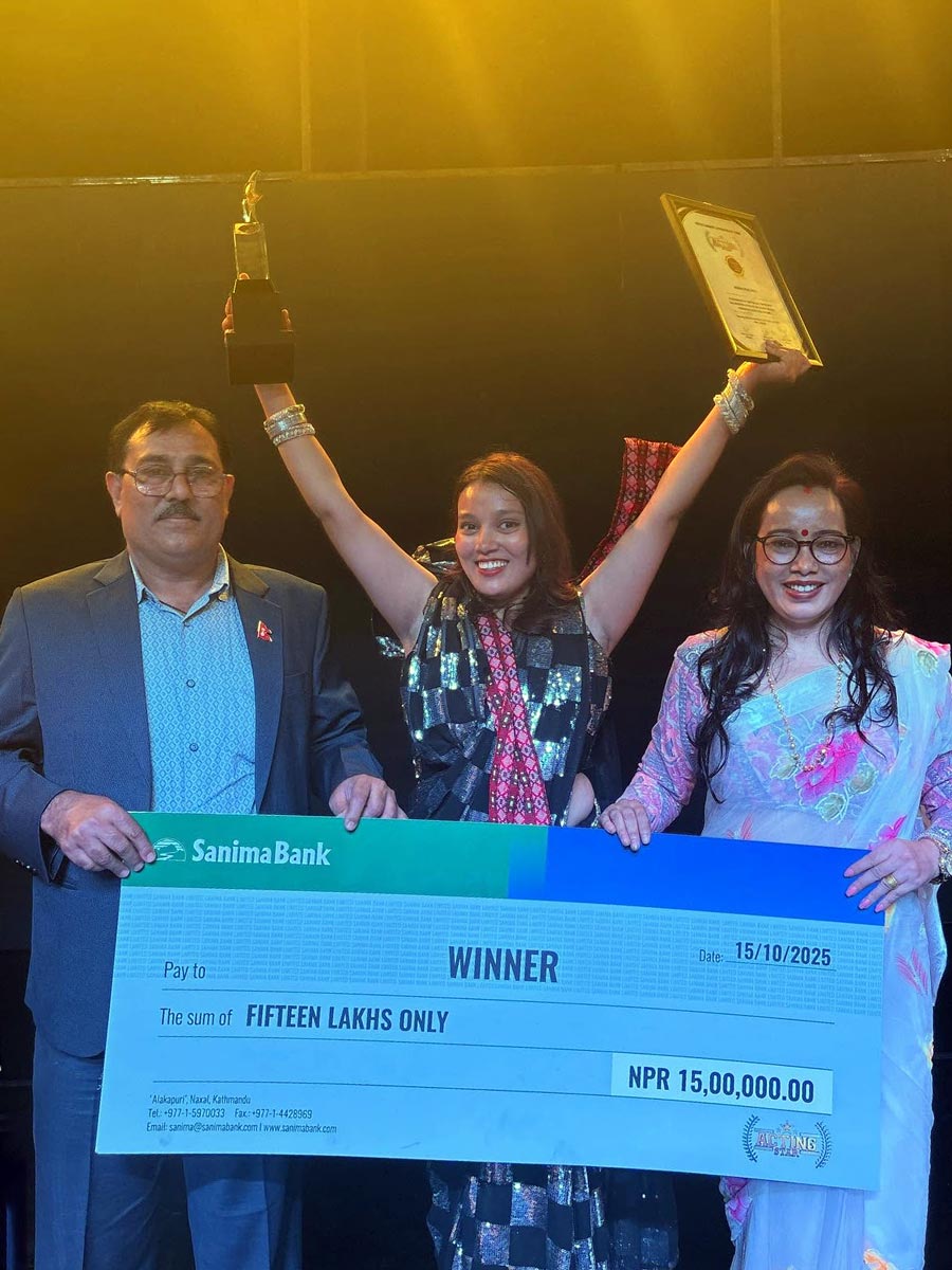 Nabina Ranabhat waving to audience after receiving Acting Star Nepal trophy.