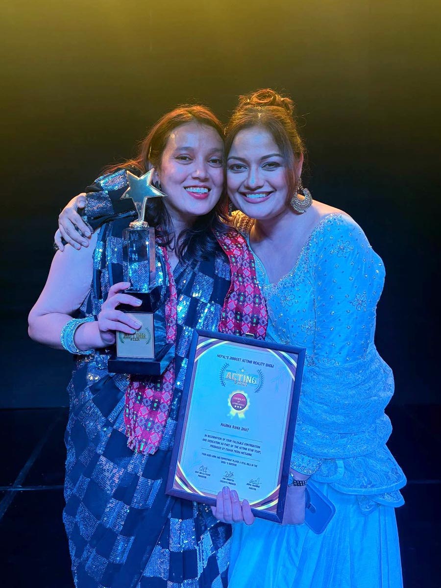 Nabina Ranabhat celebrating victory with judge Reecha Sharma