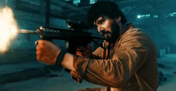 Actor Sushil Shrestha performing action sequence in Nepali film Pariwartan teaser, representing youth revolution and courage.