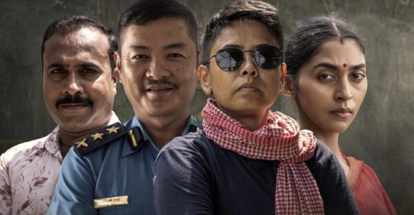 Close-up group image of four main cast members from the film Rajagunj: Pooja Sir.
