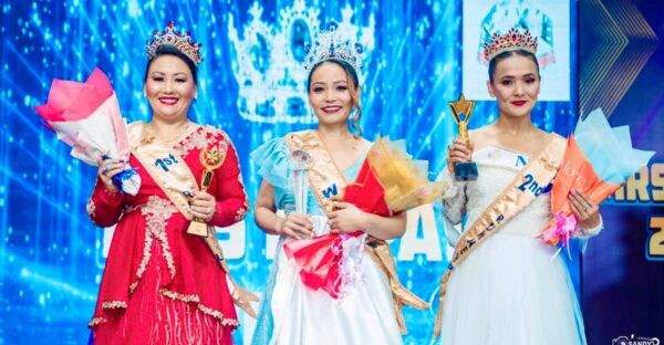Mrs. Nepal Idol 2025 winner and runners-up posing on stage during grand finale