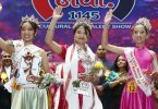 Miss Little Newa 1145 winner Suravi Bajracharya with runners-up waving on stage at cultural and talent show in Kathmandu