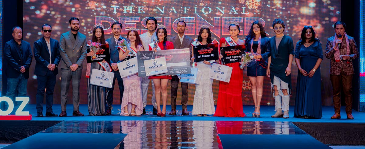 Group photo of National Designers Runway 2026 winners including Aakriti Shrestha, first runner up and second runner up holding awards.
