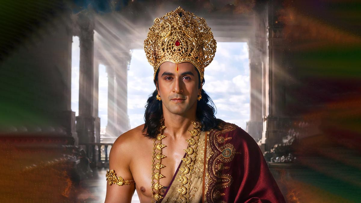 Ranbir Kapoor dressed as Lord Rama wearing a golden crown, seen in a grand cinematic scene from the Ramayana teaser with dramatic lighting and visual effects.