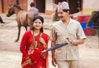 Bipin Karki and Keki Adhikari walk through a quiet village setting in Kaji, capturing a tender moment of married life.